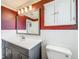 Bathroom with vanity, tile backsplash, and cabinet at 2405 Dellwood Dr, Orlando, FL 32806