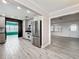 Open kitchen layout with stainless steel appliances at 2405 Dellwood Dr, Orlando, FL 32806