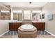 Well lit bathroom features dual sinks, a soaking tub, and a separate glass shower at 2731 Cypress Tree Trl, St Cloud, FL 34772