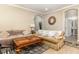 Comfortable living room featuring neutral colors and stylish decor with easy access to a bathroom at 2731 Cypress Tree Trl, St Cloud, FL 34772