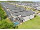 This aerial view showcases the home's private screened-in pool and well-maintained backyard at 2775 Bookmark Dr, Kissimmee, FL 34746
