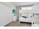 Bedroom with bunk beds, closet, dresser and TV at 2775 Bookmark Dr, Kissimmee, FL 34746