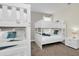 Bunk beds in a bedroom with gray walls and nightstand at 2775 Bookmark Dr, Kissimmee, FL 34746