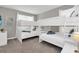Bunk beds in a bedroom with gray walls, and TV on wall at 2775 Bookmark Dr, Kissimmee, FL 34746