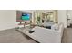 Spacious living area featuring a comfortable sectional sofa and modern decor at 2775 Bookmark Dr, Kissimmee, FL 34746