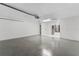 Spacious two-car garage with painted walls and polished floor at 2955 Foxcroft Ln, South Daytona, FL 32119