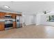 Open kitchen with stainless steel appliances including microwave, oven, and refrigerator at 2955 Foxcroft Ln, South Daytona, FL 32119