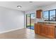 Bright kitchen features granite countertops, stainless steel sink and sliding door access to backyard at 2955 Foxcroft Ln, South Daytona, FL 32119