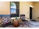 Inviting front porch with seating area for two at 2956 Falconhill Dr, Apopka, FL 32712