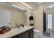 Stylish bathroom featuring sleek vanity, modern fixtures, and direct access to the backyard at 322 Harbor Trl, Enterprise, FL 32725
