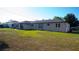 Expansive backyard with lush grass, perfect for outdoor activities and relaxation, ideal for enjoying the outdoors at 345 W Seminole Ave, Eustis, FL 32726