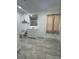 Bathroom with neutral tile flooring, vanity, toilet, and shower stall at 345 W Seminole Ave, Eustis, FL 32726