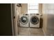 Bright laundry room features modern Samsung washer and dryer set, with tile flooring and natural light at 345 W Seminole Ave, Eustis, FL 32726