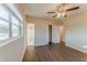 Bedroom with updated floors, windows, and closet at 3706 Wade Rd, Orlando, FL 32808