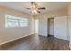Bedroom with updated flooring and a closet at 3706 Wade Rd, Orlando, FL 32808