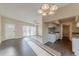 Open-concept living and dining area with abundant natural light and sliding door at 3706 Wade Rd, Orlando, FL 32808
