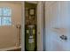 Utility closet features a Rheem water heater with energy guide label at 3706 Wade Rd, Orlando, FL 32808
