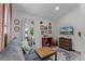 Cozy living room with comfortable seating, decorative accents, and an open doorway leading to the backyard at 407 E Jersey St, Orlando, FL 32806