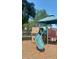 Fun playground structure with a green slide, inviting children to enjoy outdoor play and recreation at 407 E Jersey St, Orlando, FL 32806