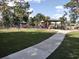 Beautiful playground with a paved walking path at 407 E Jersey St, Orlando, FL 32806