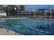 Swimming pool with lane markers and blue and orange flags is the perfect place for a swim at 407 E Jersey St, Orlando, FL 32806