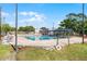 Outdoor swimming pool area with a blue covered seating area with a brick surround at 407 E Jersey St, Orlando, FL 32806