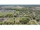Aerial view showcasing the lot within a large, established community with trees and manicured lawns at 4550 Chandler Rd, Apopka, FL 32712