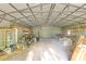 Large barn interior with open space and storage shelving at 4550 Chandler Rd, Apopka, FL 32712
