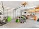 Spacious garage with ample storage space and workbench at 4550 Chandler Rd, Apopka, FL 32712