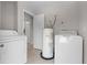 Laundry room with washer, dryer and water heater at 4751 Deer Run Rd, St Cloud, FL 34772