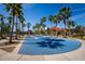 The on-site community basketball court offers an active lifestyle, enhanced by swaying palm trees at 4761 Ormond Beach Way, Kissimmee, FL 34746
