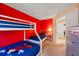 Bright bunk bedroom features a bunk bed with large window, offering bright natural light and playful decor at 4772 Vero Beach Pl, Kissimmee, FL 34746