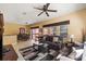 Open concept living area with dining space and sliding glass doors to the patio at 4772 Vero Beach Pl, Kissimmee, FL 34746