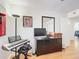 Bright bedroom with wood floors and keyboard at 480 Hildalgo Dr, The Villages, FL 32159