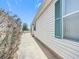 House exterior with siding and green shutters at 480 Hildalgo Dr, The Villages, FL 32159