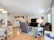 Open-concept living area with dining and kitchen; ideal for a relaxed lifestyle and entertaining at 480 Hildalgo Dr, The Villages, FL 32159