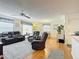 Bright living room with multiple seating options and natural light streaming through the windows at 480 Hildalgo Dr, The Villages, FL 32159