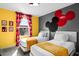 Fun, themed bedroom showcases twin beds, playful decor, and a bright, welcoming atmosphere at 5117 Killarney Way, Kissimmee, FL 34746