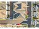 An aerial view showcases the rooflines and neat landscaping of homes along a well-kept street at 543 Wishbone Ln, Lake Mary, FL 32746