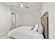 Comfortable bedroom with a cozy bed, ceiling fan, and ample natural light at 543 Wishbone Ln, Lake Mary, FL 32746