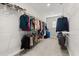 Walk-in closet with ample storage space and organized shelving for clothes and accessories at 543 Wishbone Ln, Lake Mary, FL 32746