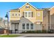 Charming two-story home with manicured lawn and black metal fence at 543 Wishbone Ln, Lake Mary, FL 32746
