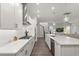 Modern kitchen boasts white cabinetry and sleek appliances at 543 Wishbone Ln, Lake Mary, FL 32746