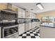 Kitchen with stainless steel appliances and decorative backsplash at 546 Queens Mirror Cir, Casselberry, FL 32707