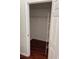 A walk-in closet with wooden floors and metal shelving at 581 Brantley Terrace Way # 109, Altamonte Springs, FL 32714