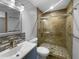 Updated bathroom featuring a glass-enclosed shower and modern vanity at 6 Almond Trce, Ocala, FL 34472