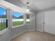 Bright breakfast nook with large windows offering views of the backyard at 6 Almond Trce, Ocala, FL 34472