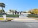 Charming one-story home boasting a covered entry, new gray driveway and a well-maintained yard at 6003 W Harwood Ave, Orlando, FL 32835