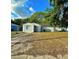 Charming single-story home with a well-maintained lawn, inviting entrance, and mature trees at 613 20Th St, Orlando, FL 32805