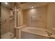 Bathroom features separate shower and tub with natural light and a mirrored vanity at 6936 Della Dr # 33, Orlando, FL 32819